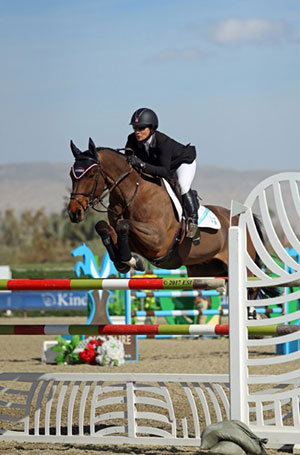 Mandy Porter and Milano on their way to a $75,000 Horseware Ireland Grand Prix win. Photo by ESI Photography