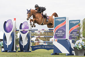 USA’s Todd Minikus and Babalou top an 18-horse jump off to claim victory in the final leg of the Longines FEI World Cup™ Jumping 2016/2017 North American League. Photo by FEI/Debra Jamroz