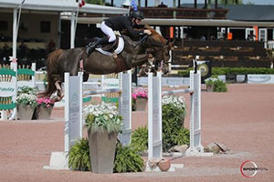 Thumbnail for Daniel Coyle Takes Two Grand Prix Wins on Canadian Mounts at WEF