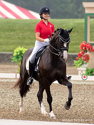 Alexandra Meghji of Toronto, ON led the Ontario/Alberta Team to a fourth place finish in the Young Rider Team Competition on the opening day of dressage at the 2017 Adequan/FEI North American Junior & Young Rider Championships (NAJYRC) in Saugerties, NY. Riding Rigo, owned by Diana Belevsky, she placed fifth on the individual leaderboard. Photo by Cealy Tetley