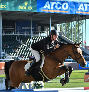 Daniel Coyle and Fortis Fortuna won the ATCO Energy Cup at the Spruce Meadows North American. Photo by Spruce Meadows MEdia Services