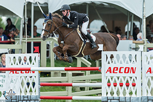 Ireland’s Daniel Coyle and his Canadian-bred mount, Tienna, won the $35,000 AECON Jumper Classic to conclude the CSI3* Ottawa International Horse Show on Sunday, July 23, at Wesley Clover Parks in Ottawa, ON. Photo by Ben Radvanyi Photography