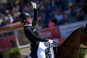 Bettina Hoy (GER) sets a new European Championships record with her dressage mark of 24.6 on Seigneur Medicott to give the defending German team a commanding lead after the first day of competition at the FEI European Eventing Championships in Strzegom (POL). Photo by FEI/Jon Stroud