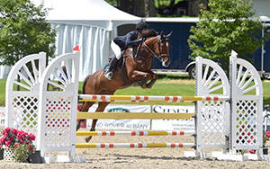Mckayla Langmeier of East Granby, CT, won the $10,000 Show Jumping Hall of Fame Junior/Amateur-Owner Jumper Classic, presented by Miller & Associates, riding Durosa W on Sunday, August 13, during the final day of the 2017 Vermont Summer Festival in East Dorset, VT. Photo by Andrew Ryback Photography