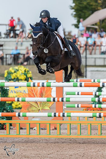 Ali Ramsay of Victoria, BC, won the $86,000 CSI2* Grand Prix, riding Hermelien VD Hooghoeve at the CSI2* Canadian Show Jumping Tournament. Photo by Ben Radvanyi Photography