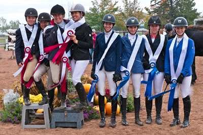 1.1m Section Team gold winners from New Brunswick with the silver medal winning team from Nova Scotia. Team NB (l-r): Jennika Charette on Caprice, Suzanne Stevenson on Piccolo Mondo, Holly Murley on Pandemonia and Becky Gordon on Gigolo VK. Team NS (l-r): Grace Munro on Ever So Clever, Alexandra Oulton on Ballorig, Kalie McLellan on Cayo Coco and Lauren Golding on Dark Knight.