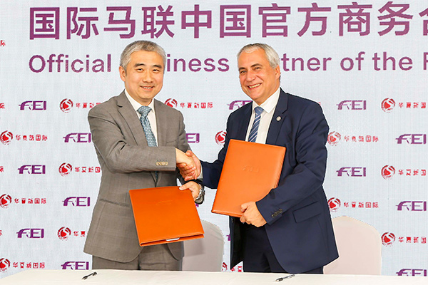 The Fédération Équestre Internationale (FEI), the world governing body for equestrian sport, has announced a brand new partnership with China National Sports International (CNSI), a sports and entertainment company that specialises in equestrian sports in China. Pictured left to right: Sun Liming, Executive Director of China National Sports International with FEI President Ingmar De Vos. Photo by FEI/Yuanpu Xia