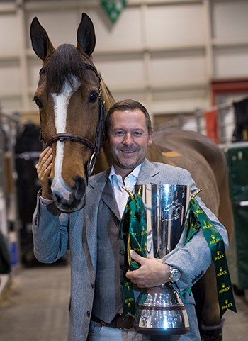 Eric Lamaze and Fine Lady 5, owned by Artisan Farms, with the Rolex IJRC trophy. Photo by ROLEX/Kit Houghton