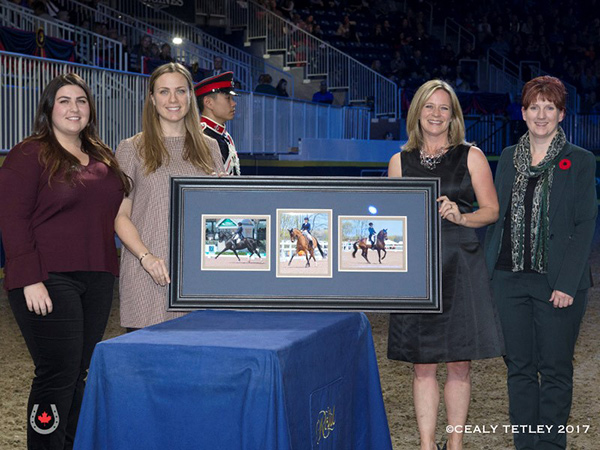 Dressage Owner of the Year Award from EC Dressage Committee Chair, Victoria Winter and EC Dressage Manager, Christine Peters during a special presentation on Nov. 9, 2017 at the Royal Horse Show in Toronto, ON. L to R: Megan Irving, Olivia Irving, Victoria Winter, Christine Peters. Photo by Cealy Tetley - www.tetleyphoto.com