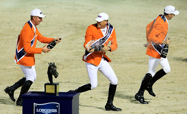 Champagne celebration time for Team Netherlands after winning the Longines FEI Jumping Nations Cup™ Final at the Real Club de Polo in Barcelona (ESP) last September. Photo by FEI/Jim Hollander