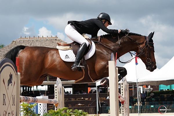 Tiffany Foster and Brighton won the $70,000 Hollow Creek Farm 1.50m Classic at the Winter Equestrian Festival. Photo by Sportfot