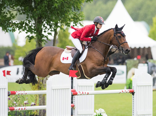 Tiffany Foster of North Vancouver, BC, was double clear for Canada riding Victor, owned by Artisan Farms and Torrey Pines Stable. Photo by Cara Grimshaw