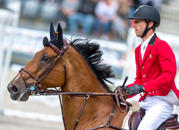 Eyes on the prize - complete concentration from Pieter Devos and Espoir on their way to clinching a vital first-round clear to help Team Belgium to an historic victory in the Longines FEI Jumping Nations Cup of the Netherlands in Rotterdam (NED). Photo by FEI/Arnd Bronkhorst