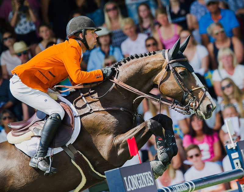 Maikel van der Vleuten and IDI Utopia helped The Netherlands to another spectacular victory in the Longines FEI Jumping Nations Cup™ of Sweden in Falsterbo (SWE). Photo by FEI/Satu Pirinen