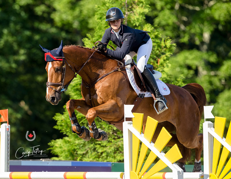 Olivia Stephenson of Calgary, AB earned her second gold medal of NAYC 2018, winning the Jumping Children’s Individual Final with Chaccana.
