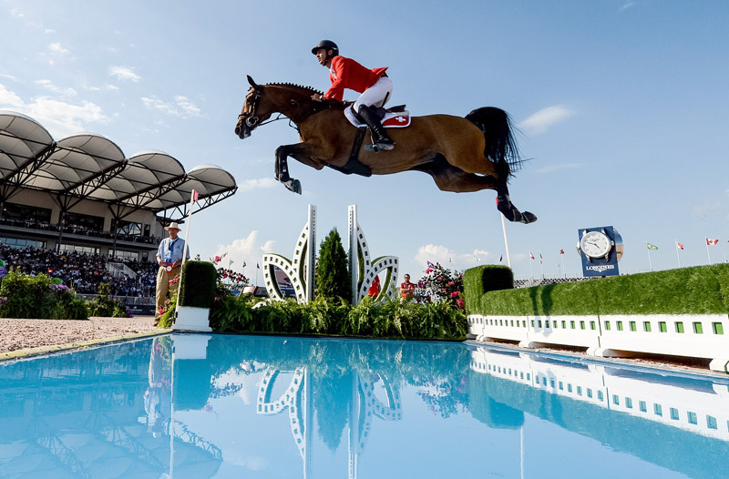 A brilliant round from Steve Guerdat and Bianca put the 2012 Olympic champion and Team Switzerland into pole position as the Bank of America Jumping Championship got underway at the FEI World Equestrian Games™ 2018 in Tryon, USA today.
