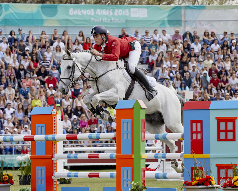 Flying high to victory in a five-way jump-off, Italy’s Giacomo Casadei with his mount Darna Z take gold in the Individual jumping final at the Youth Olympic Games Buenos Aires 2018.