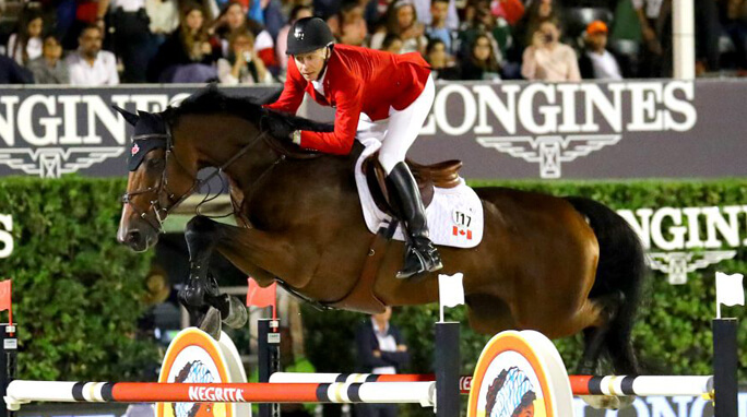 Mario Deslauriers (CAN) riding Bardolina 2 during the Challenge Cup of the Longines FEI Jumping Nations Cup Final in Barcelona. Photo by Scoop Dyga/Icon Sport