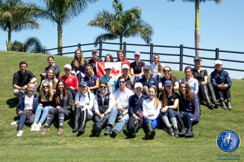 A group photo of the riders who participated in the 2018 Florida International Youth Dressage Championships at the Adequan® Global Dressage Festival. Photo © Lily Forado