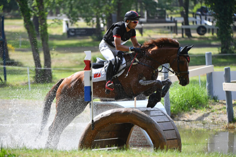 Two-time Olympian Alex Hua Tian rode Don Geniro to second place at the special Olympic qualifier held in Saumur (FRA) over the weekend to help secure China's first-ever Olympic team qualification in Eventing. Ouest Image