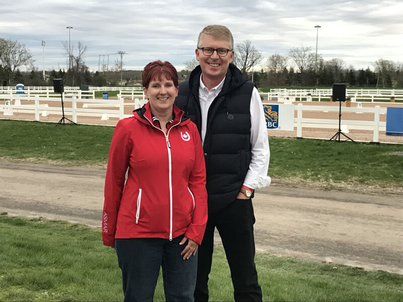 Dr. Geoff Vernon, right, spearheaded the development of the Dressage Youth Development Fund and, along with several collaborators, kick-started the fundraising with a generous $10,000 donation. He is pictured with Christine Peters, Equestrian Canada Senior Manager of the Dressage Olympic/Paralympic Program, at the 2019 Ottawa Dressage Festival. Photo ©EC/Erin Foster