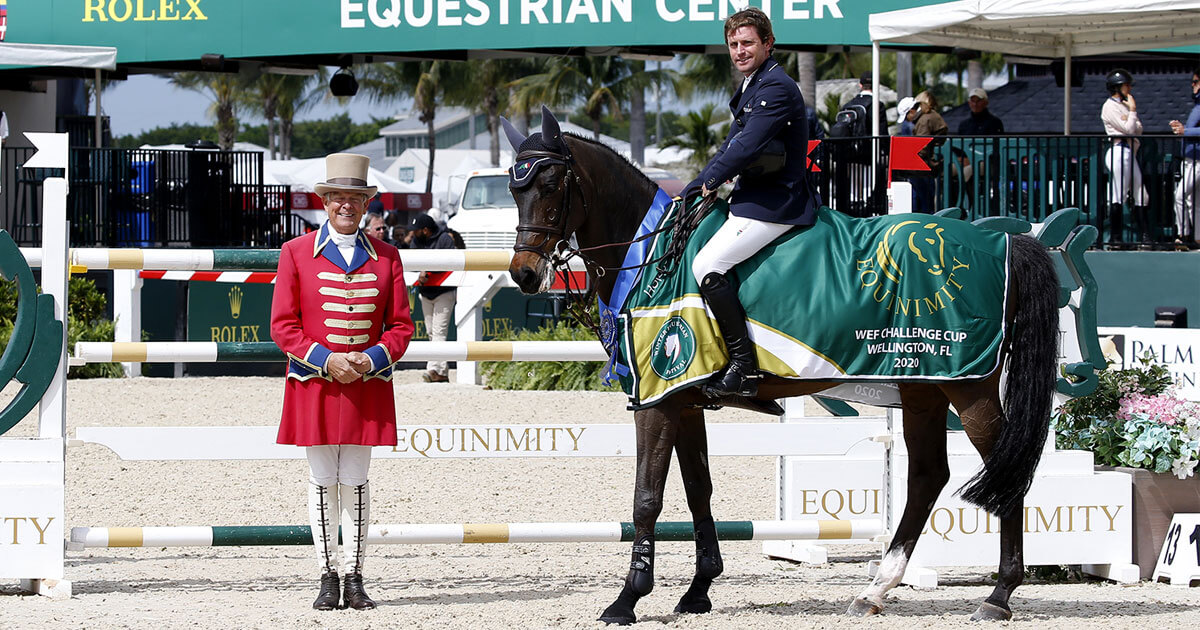 Darragh Kenny and Carthano in their winning presentation with ringmaster Steve Rector. (Photo © Sportfot)