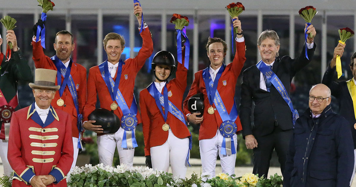 The winning United States team, including Andy Kocher, Brian Moggre, Adrienne Sternlicht, Lucas Porter, and Chef d’Équipe Robert Ridland in their winning presentation with Equestrian Sport Productions President Michael Stone and ringmaster Steve Rector. Photo © Sportfot