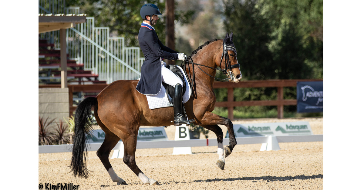 Nick Wagman and Zenith demonstrate the nuances a double bridle allows during a pirouette in a Grand Prix test at Pacific Coast Dressage in Californi. (Kim Miller photo)