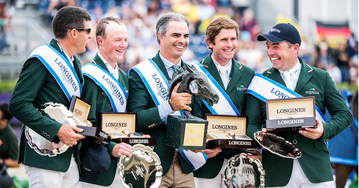 Team Ireland celebrate their win on podium at Longines FEI Jumping Nations Cup™ Final at the Real Club de Polo in Barcelona (ESP). (FEI/Lukasz Kowalski)