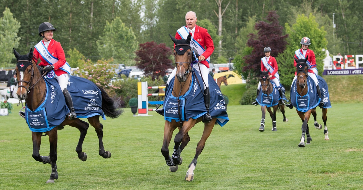Team Canada: Lisa Carlsen, Mario Deslauriers, Nicole Walker and Tiffany Foster during the lap of honour after winning the CSIO5* Longines FEI Jumping Nations Cup™ of Canada at Thunderbird Show Park in Langley, BC, June 2, 2019 (© FEI/Rebecca Berry)