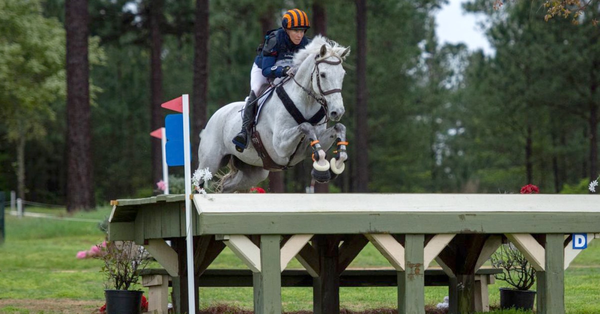 Liz Halliday-Sharp and Cooley Quicksilver jumping a cross-country fence at the Stable View event.