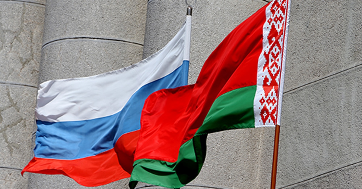 Flags of Russia and Belarus flying together.