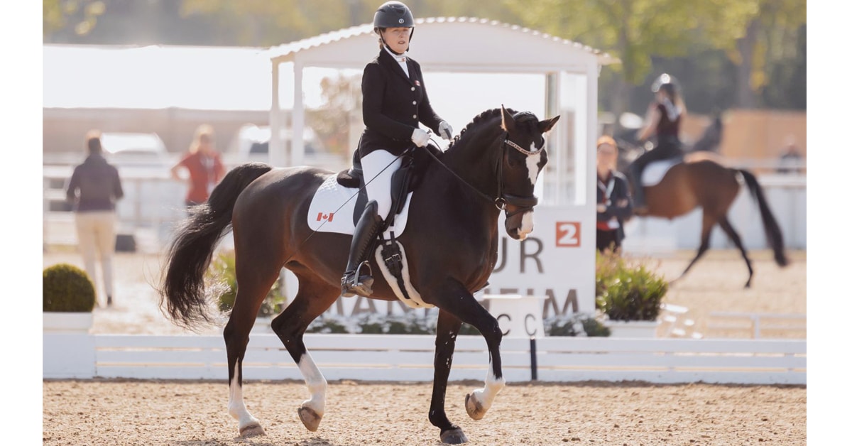 Roberta Sheffield and Fairuza competing in a dressage ring in Germany.