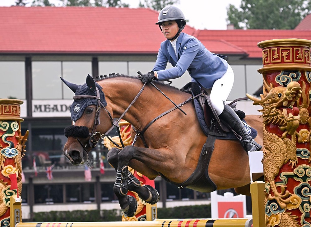 Mimi Gochman and Celina jumping a fence at Spruce Meadows.