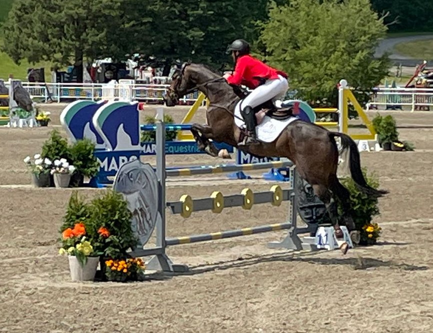 Colleen Loach and FE Golden Eye jumping.