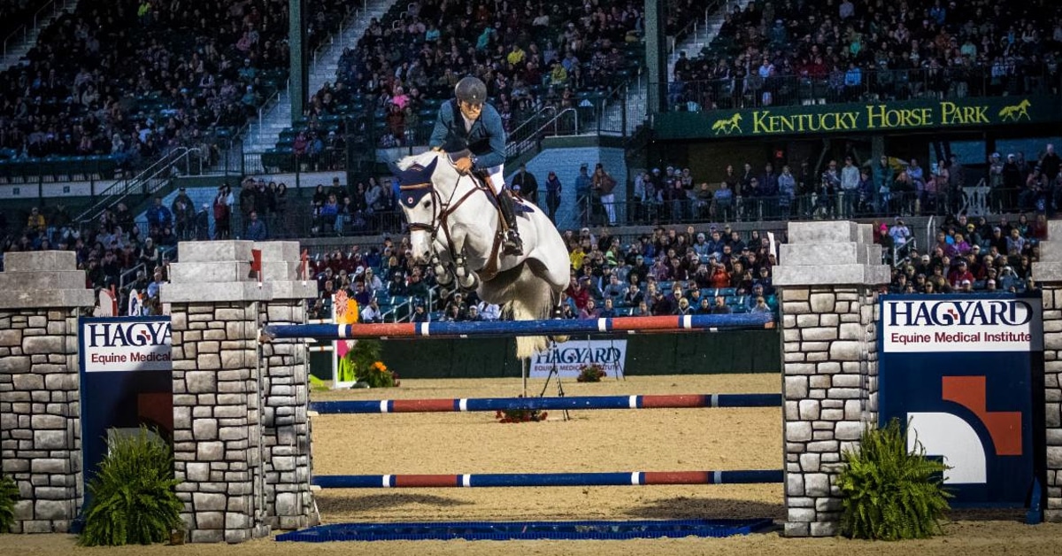Horse and rider jumping a fence in Kentucky.