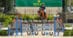 A horse and rider jumping a fence at WEF.